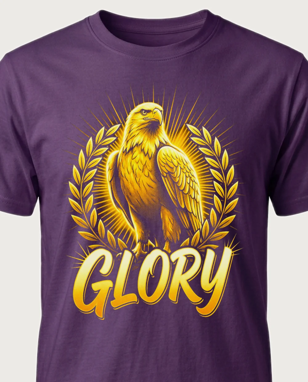 GLORY eagle — Divine Gold on a purple tee