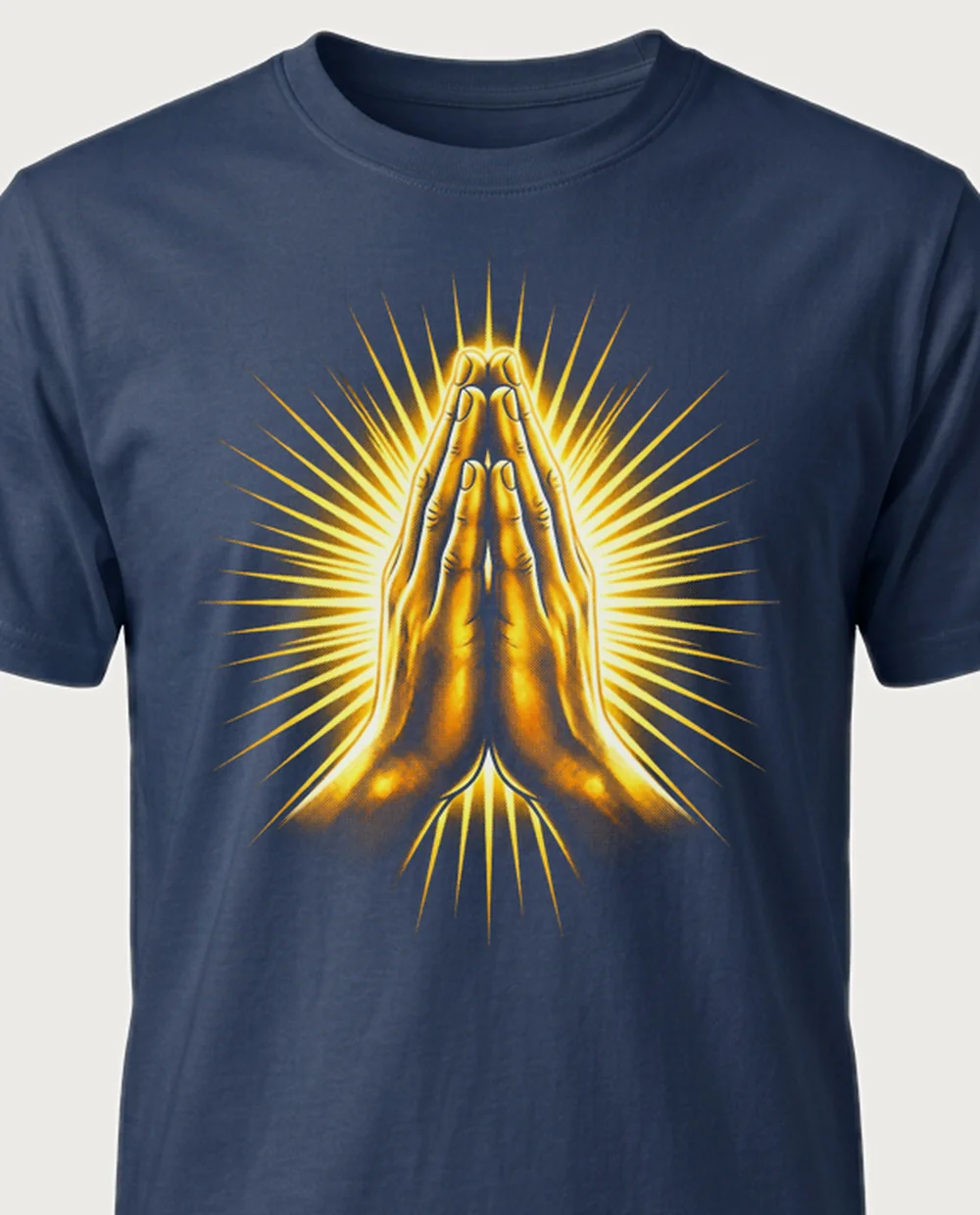 Praying hands — Divine Gold graphic on a navy tee