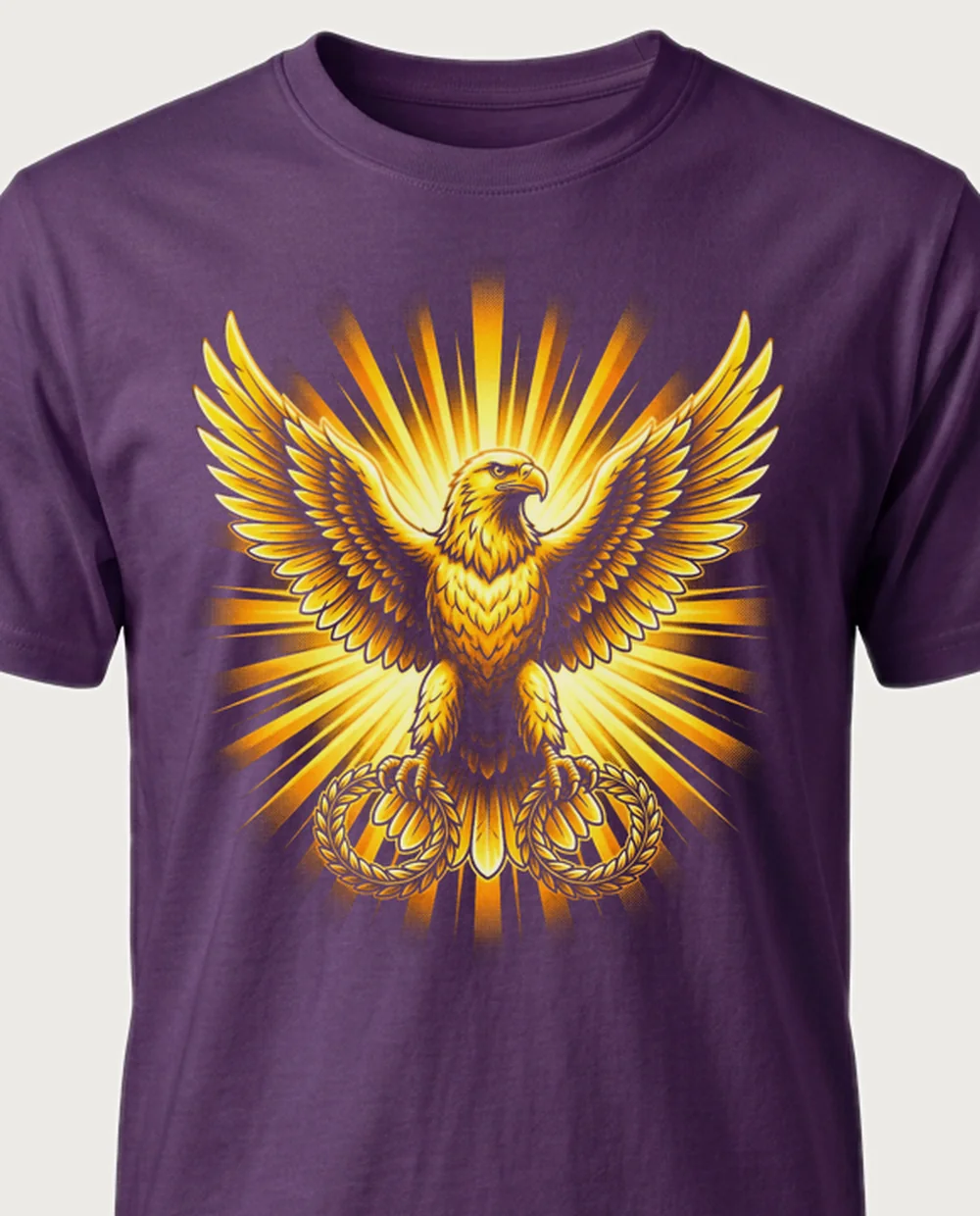 Eagle — Divine Gold graphic on a purple tee