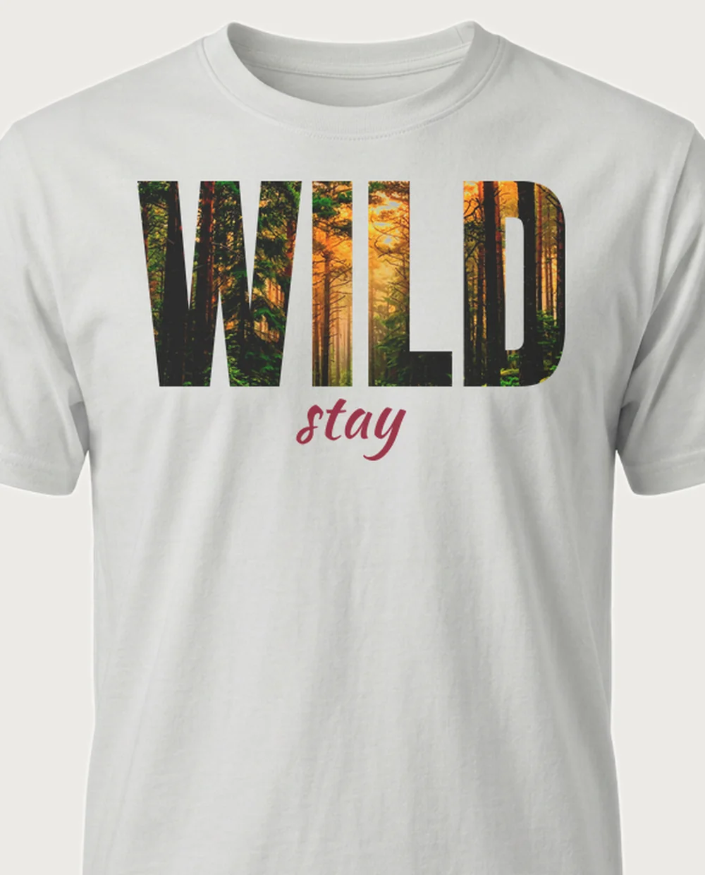 stay WILD forest — Knockout Word on an ash tee