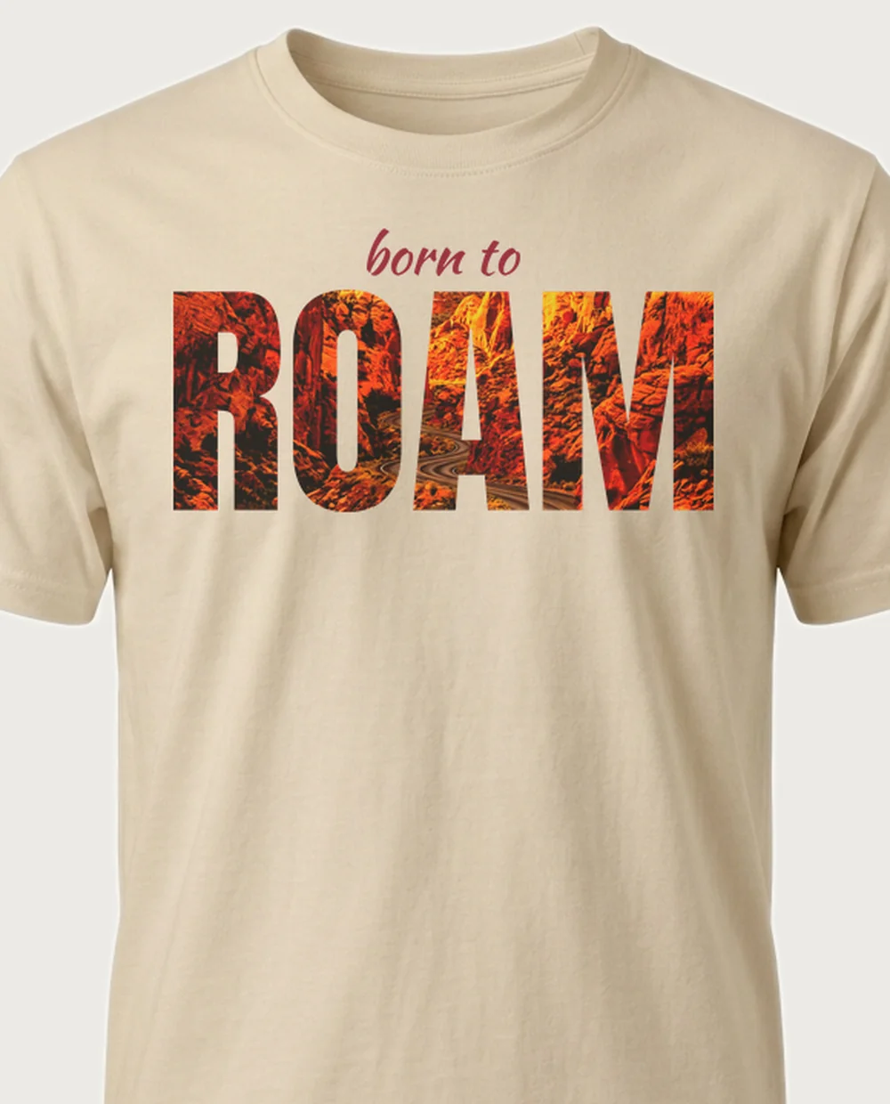 born to ROAM canyon — Knockout Word on a sand tee