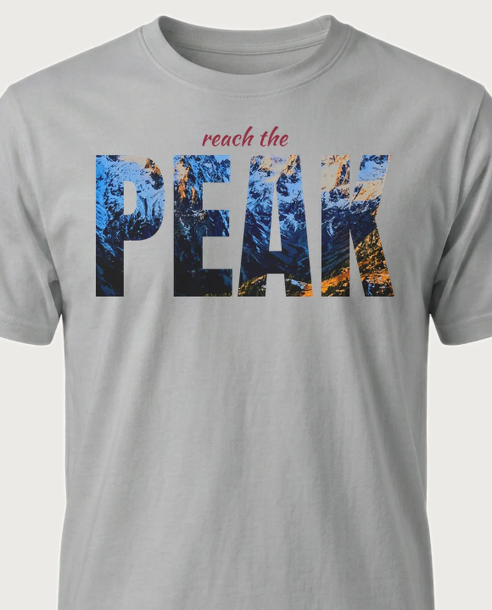 reach the PEAK summit — Knockout Word on a sport grey tee