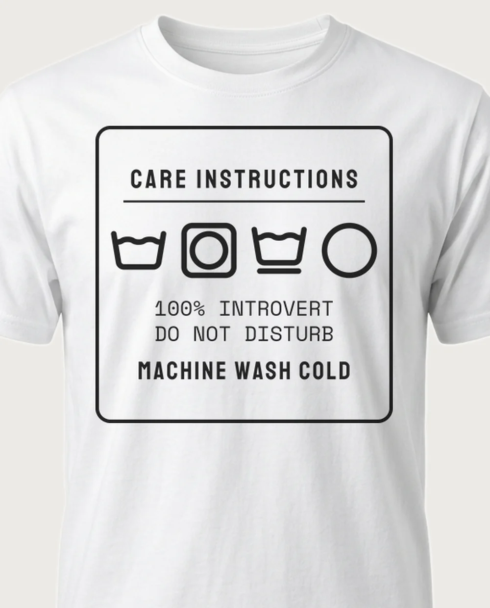'100% INTROVERT' — Care Label on a white tee