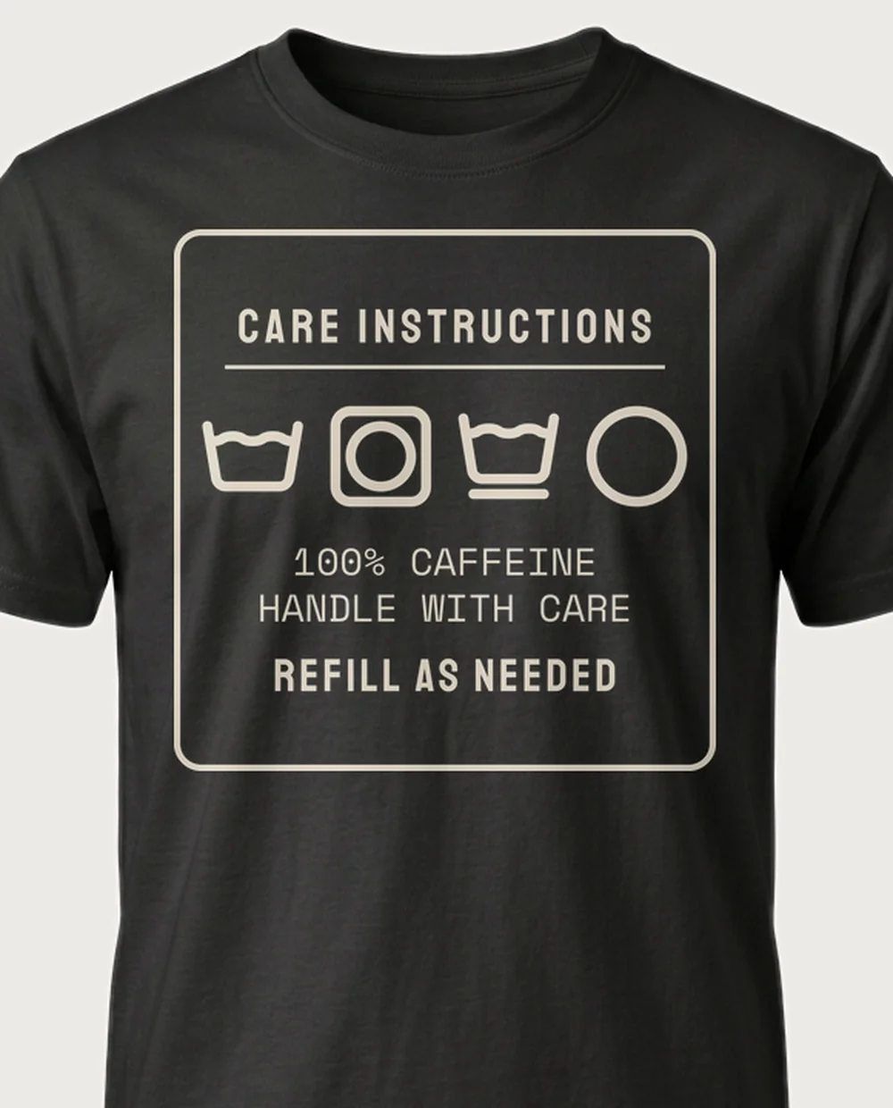 '100% CAFFEINE' — Care Label on a black tee