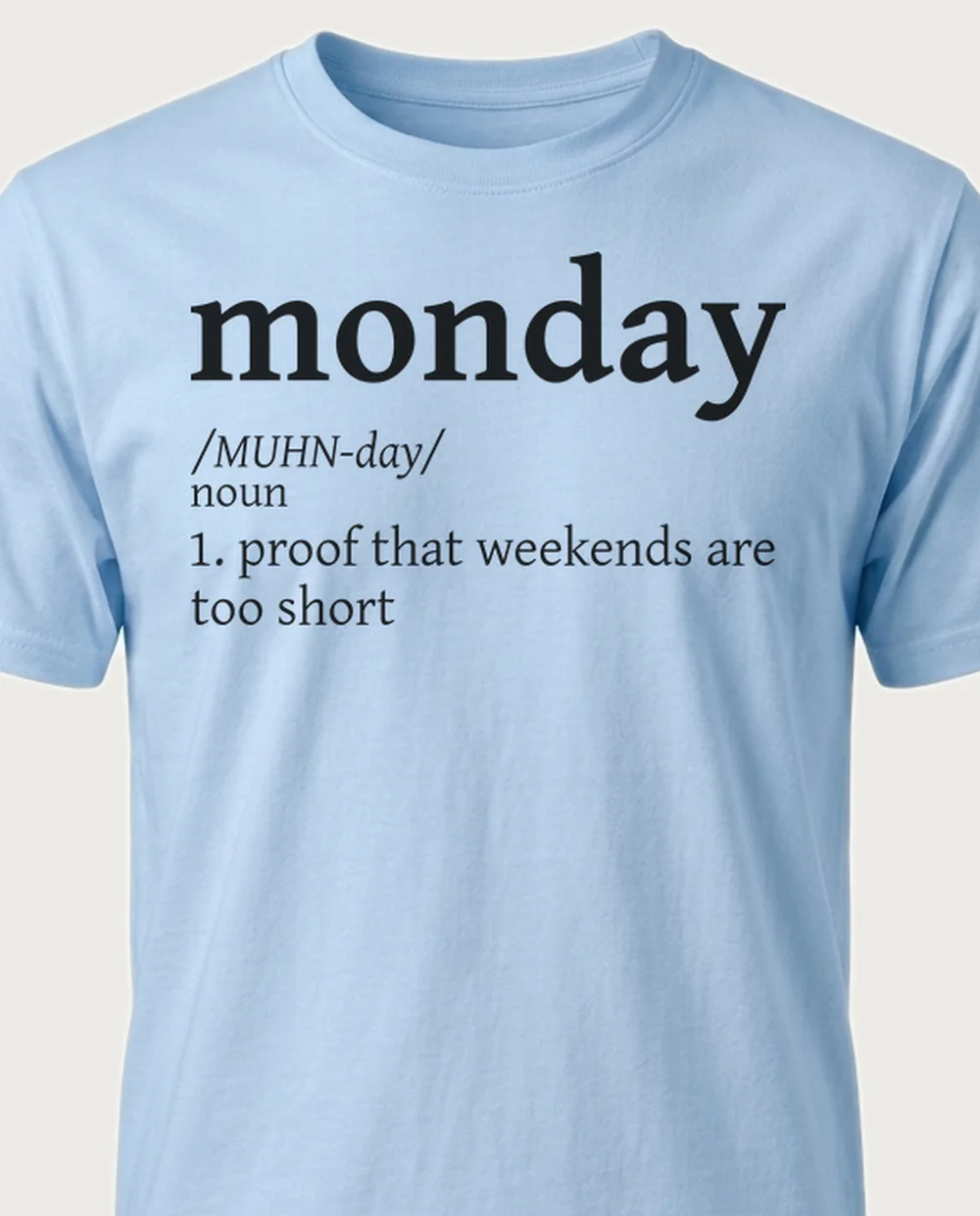 'MONDAY' — Dictionary on a light blue tee