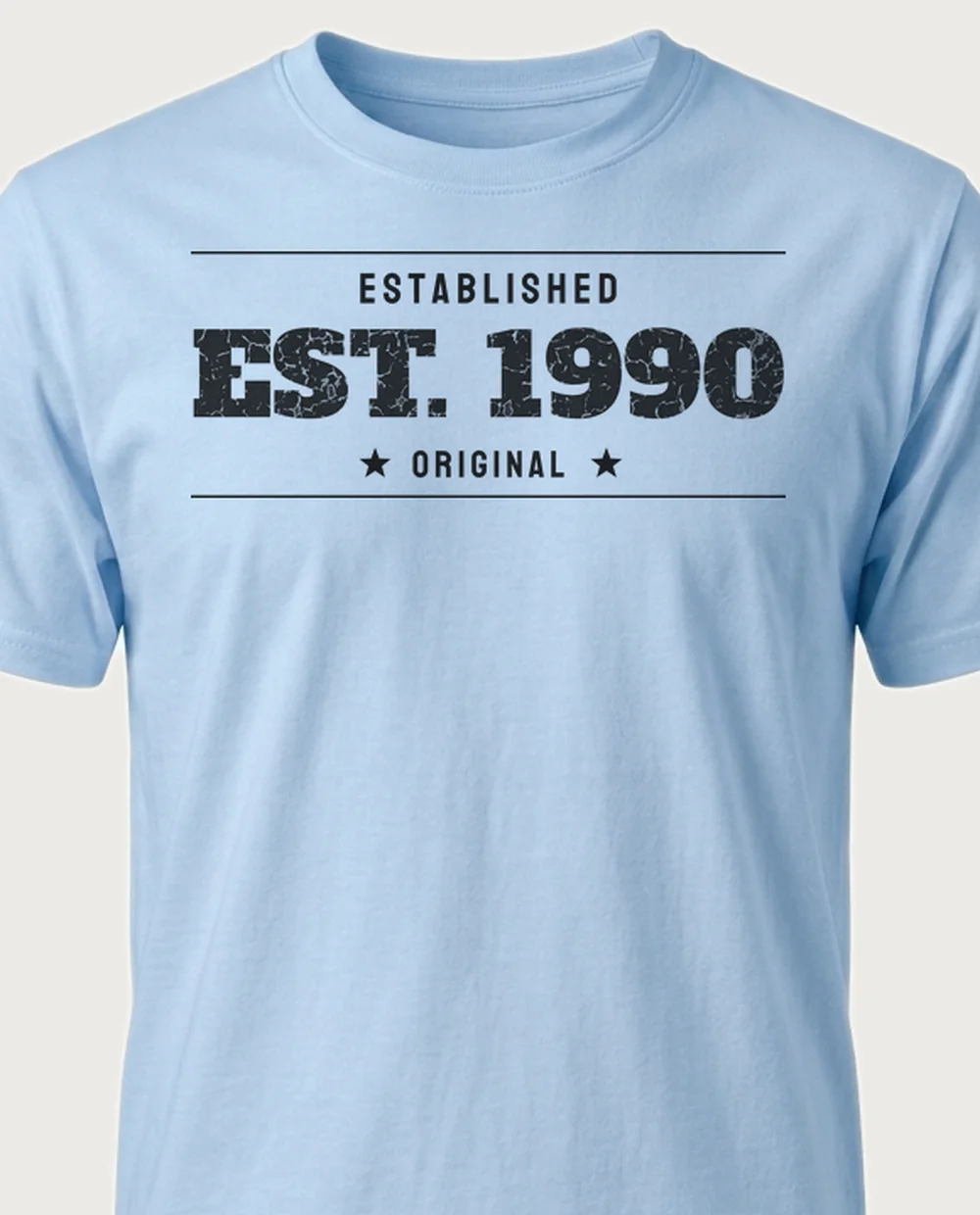 'EST. 1990' — Established Since on a light blue tee