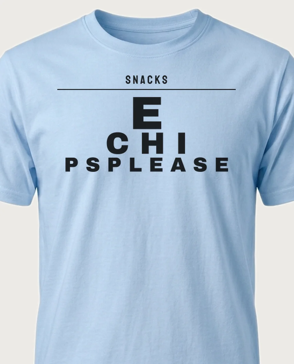 'SNACKS' — Eye Chart on a light blue tee