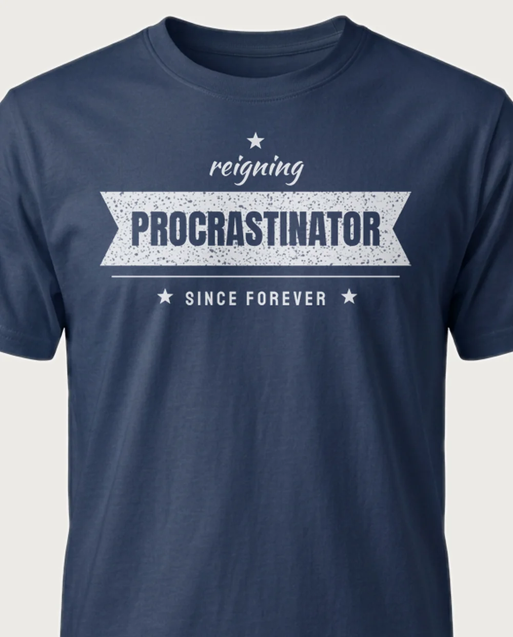 'PROCRASTINATOR' — Ribbon Banner on a navy tee