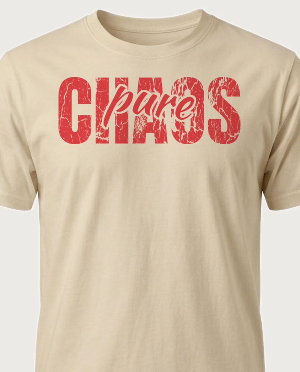 'CHAOS' — Script Overlay on a sand tee