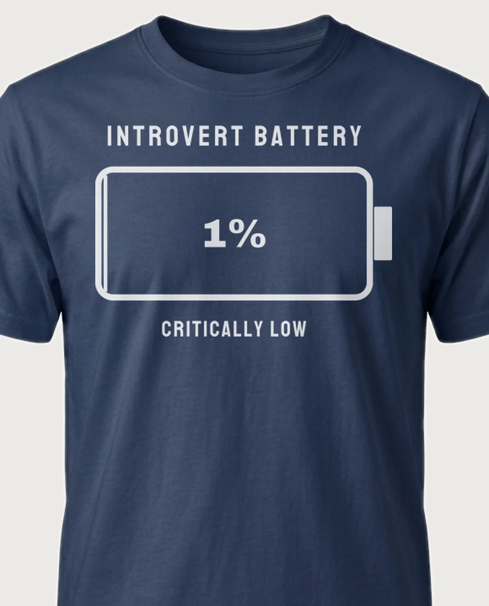 'Introvert Battery — Critically Low' on a navy tee