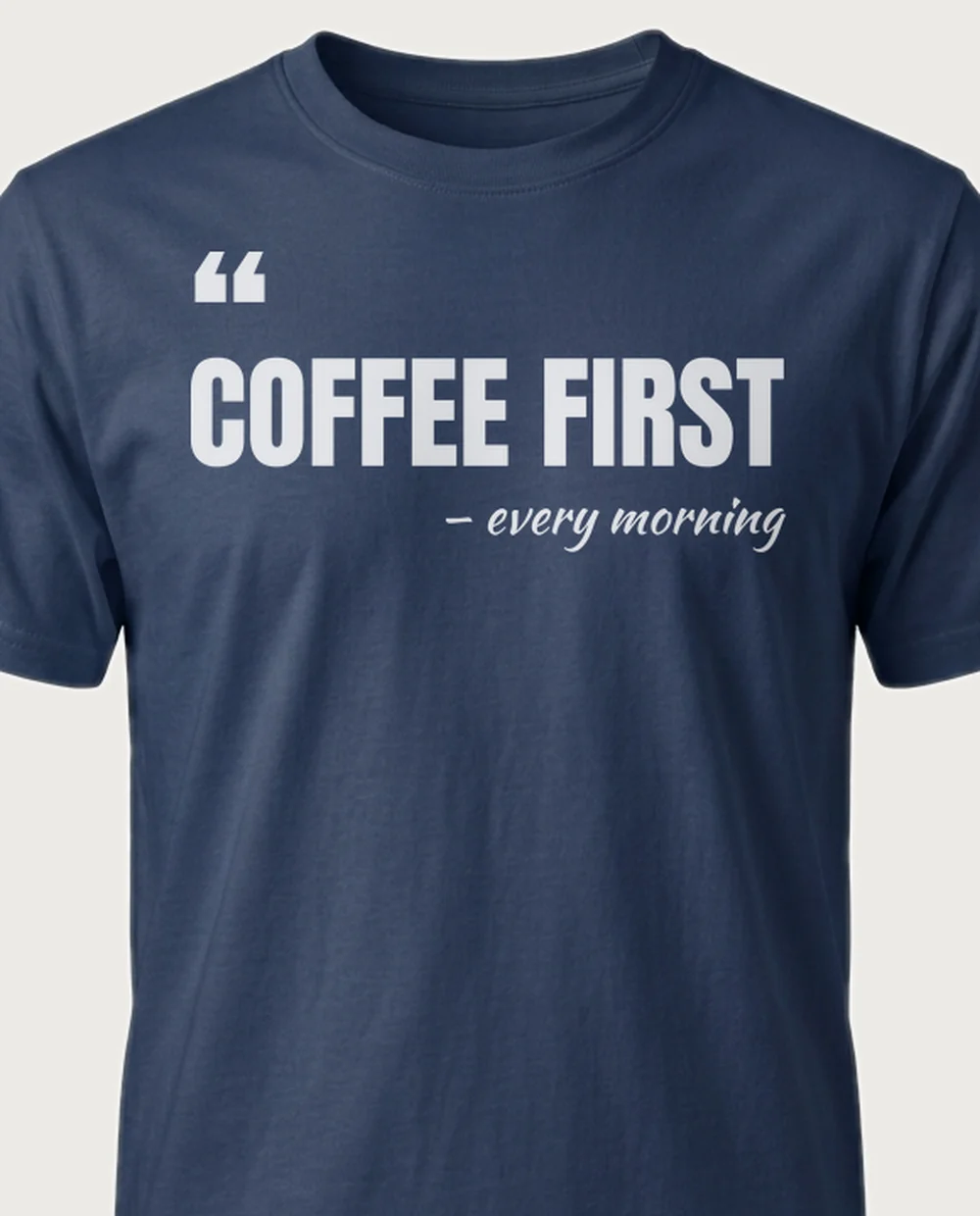'Coffee first' — The Quote on a navy tee