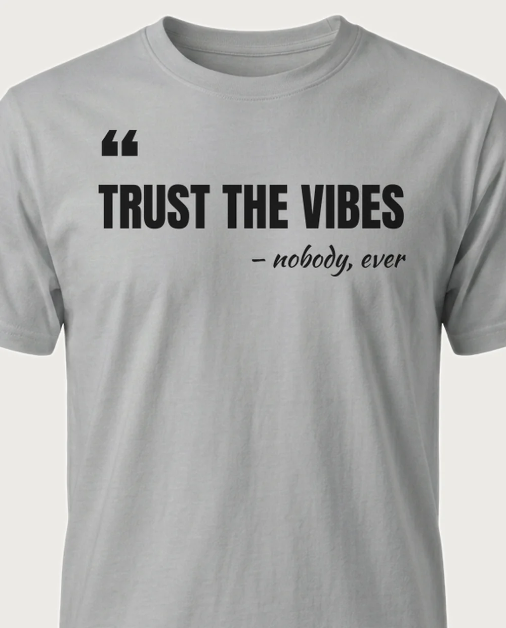 'Trust the vibes' — The Quote on a sport grey tee