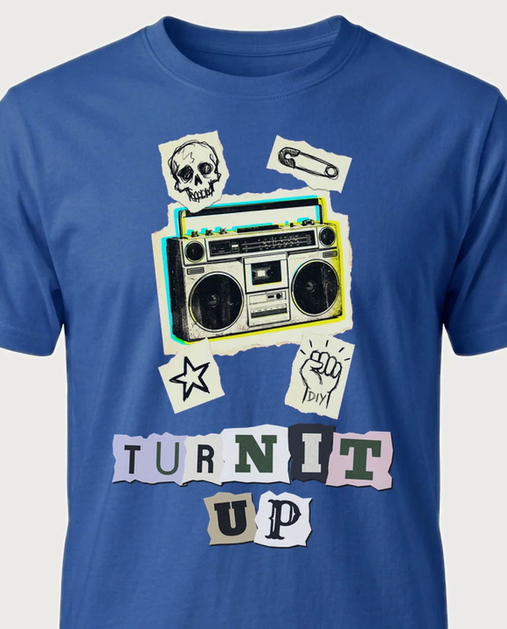TURN IT UP boombox — Ransom Zine on a royal blue tee