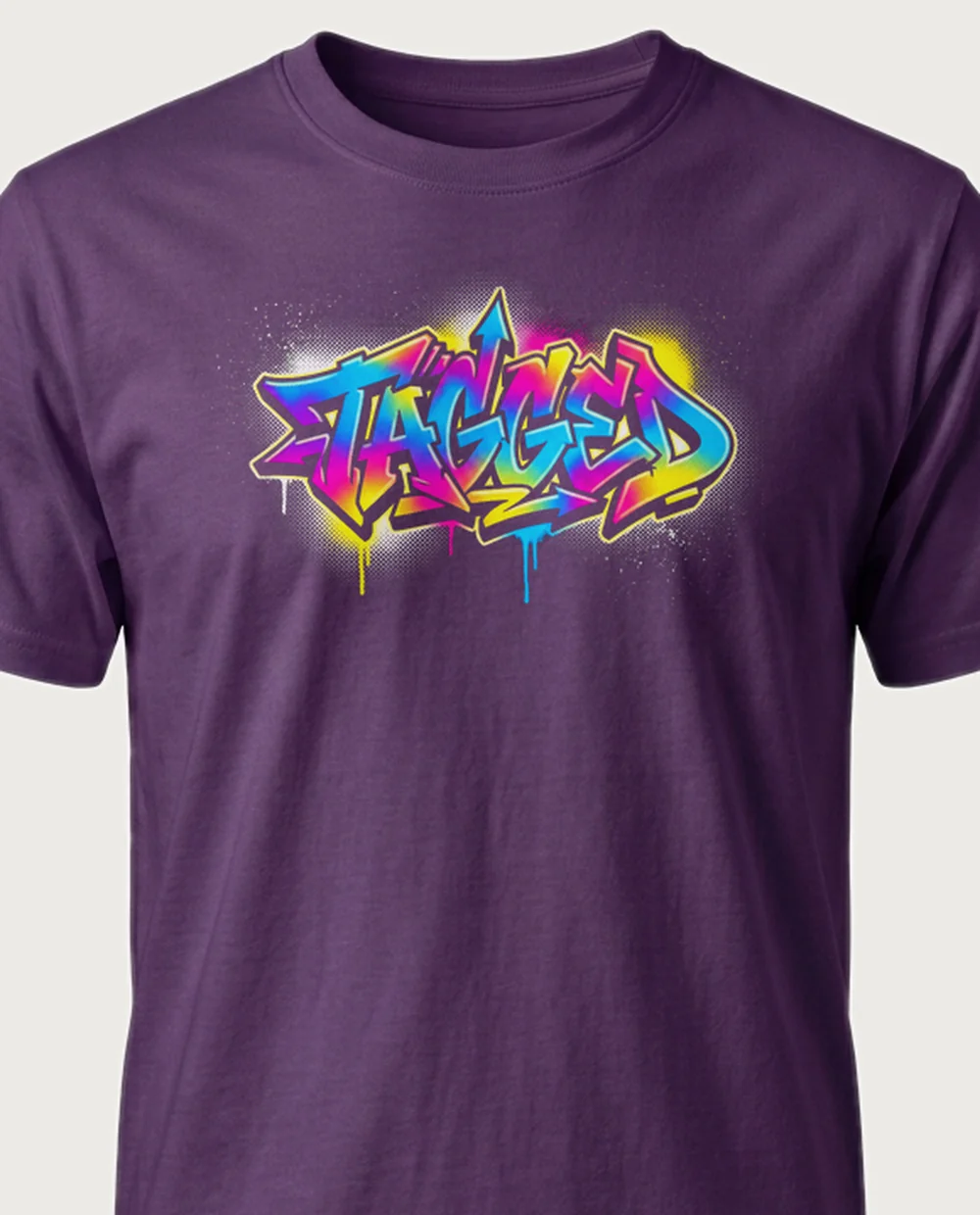 'TAGGED' — Halftone Graffiti on a purple tee
