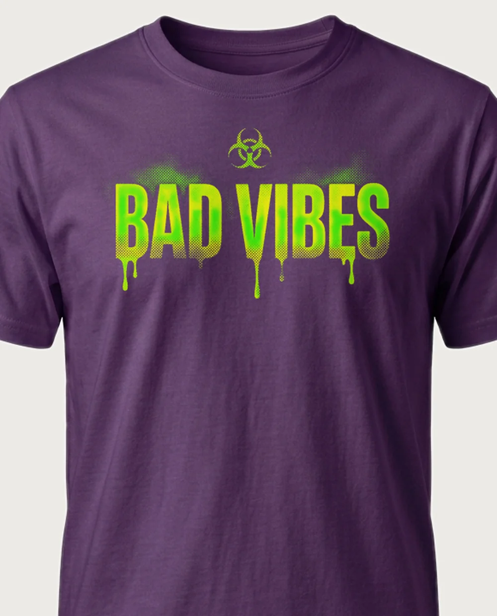 'BAD VIBES' — Halftone Toxic on a purple tee