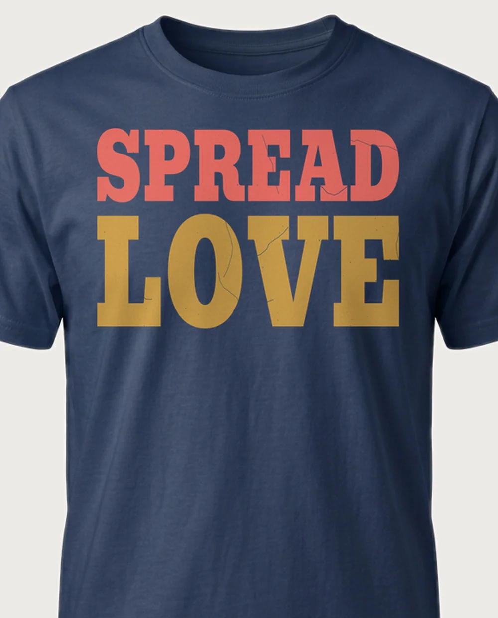 'SPREAD LOVE' — Rainbow Mantra on a navy tee