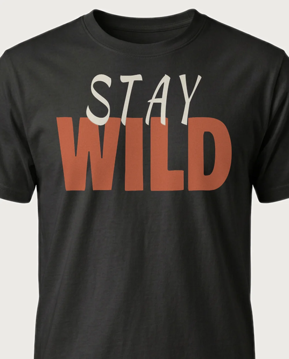 'STAY WILD' — Script + Display Mix on a black tee
